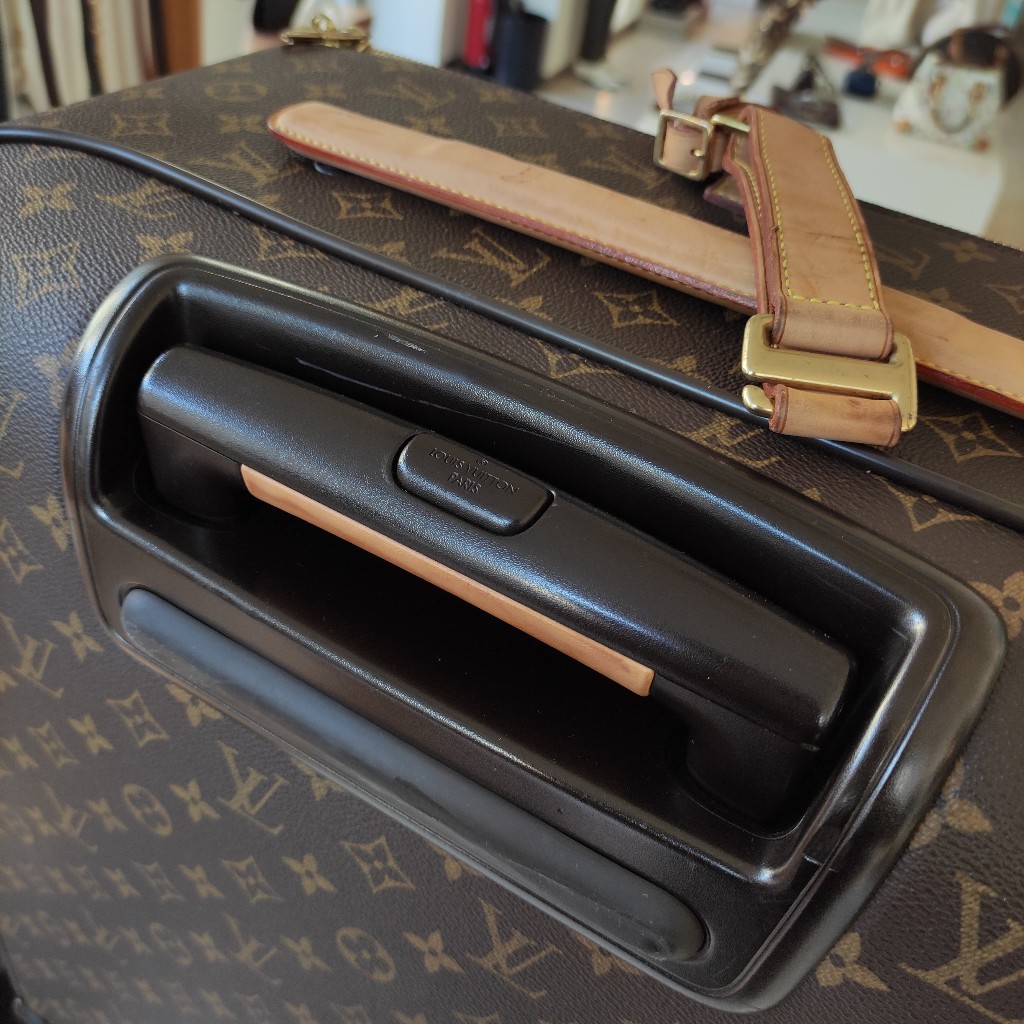 Louis Vuitton trolley Pegase 65 in tela monogram e finiture in